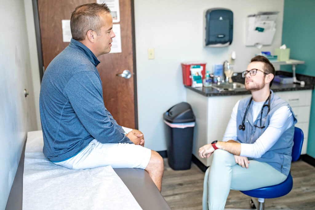 Big Tree Medical consulting with patient