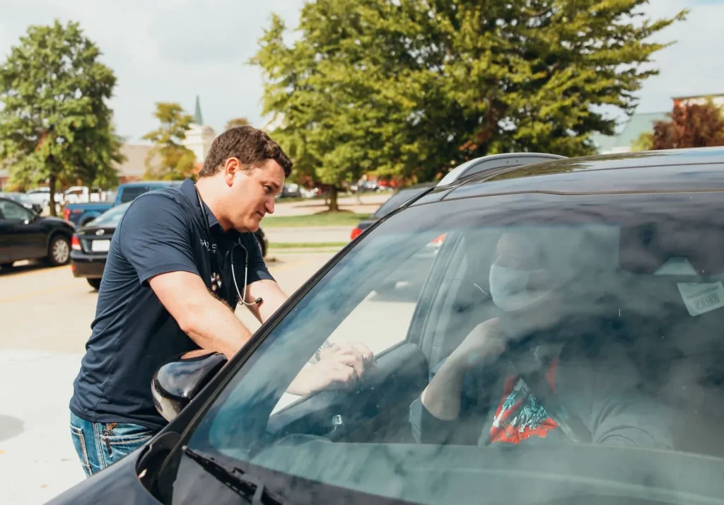 Big Tree medical provider seeing patient at drive-up clinic