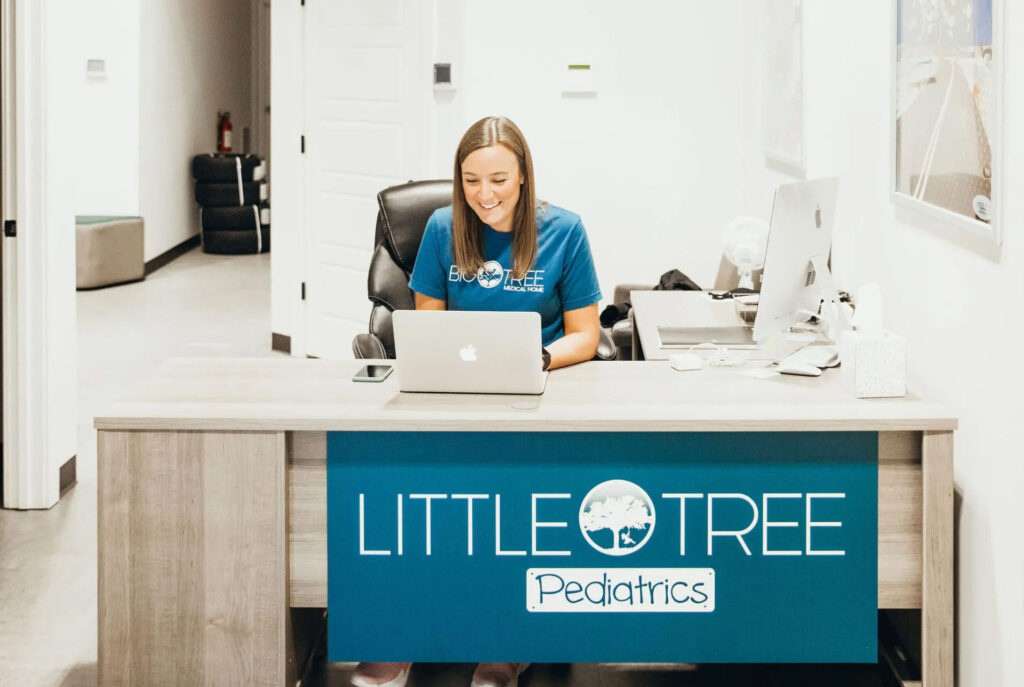 Little Tree Pediatrics staff on computer at desk