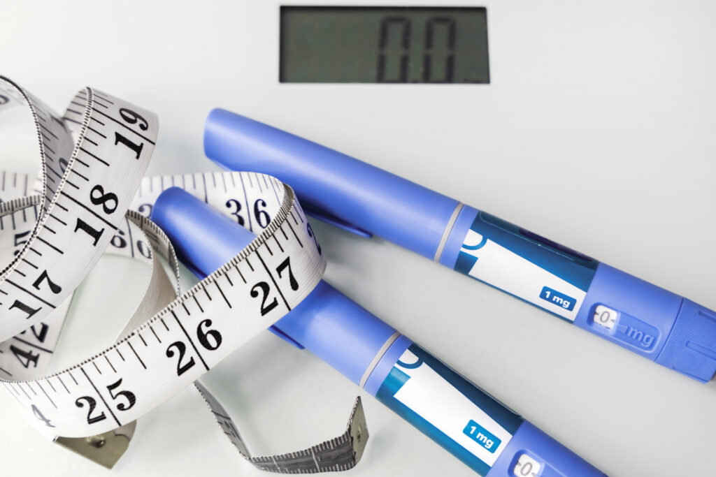 Ozempic Insulin injection pen for diabetics. Concept of losing weight with the drug.